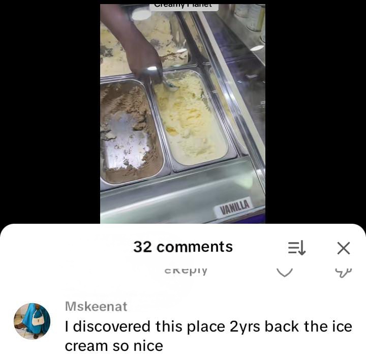 Staff scooping fresh vanilla ice cream at Creamy Planet