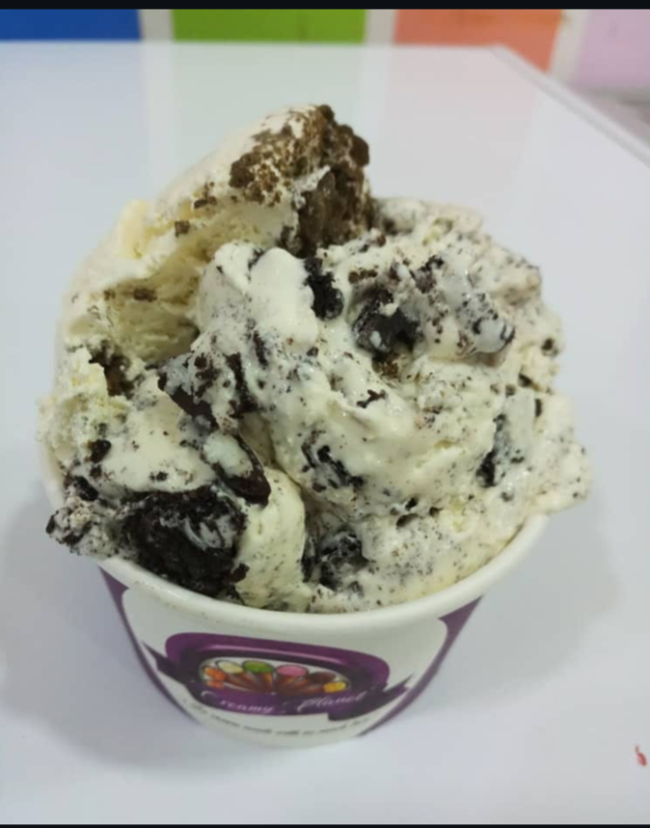 Cookies and cream ice cream loaded with Oreo pieces in a Creamy Planet cup